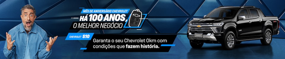 Homem com uma expressão de surpresa à esquerda, Chevrolet S10 à direita e texto promocional sobre o carro e um século de história da Chevrolet no centro.