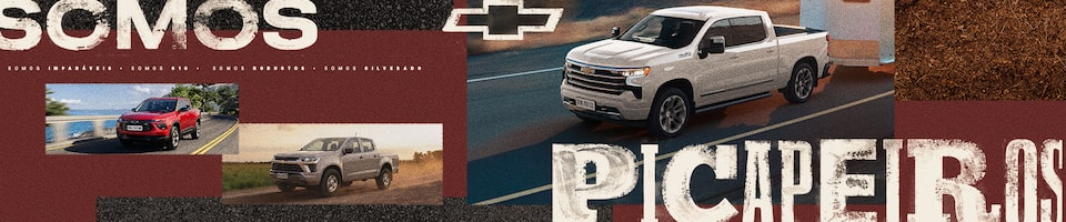 Chevrolet Silverado na cor branca centralizada com paisagem rural ao fundo. Há um texto referente à campanha #SomosPicapeiros em ambos os lados da imagem.